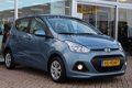 Hyundai i10 - 1.0i 66pk Blue Comfort + Tom Tom Rijklaar - 1 - Thumbnail