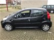 Peugeot 107 - 1.0-12V Sportium Leuke 107, 5 DEURS, ZWART, AIRCO - 1 - Thumbnail