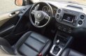 Volkswagen Tiguan - 2.0 TSI automaat / camera achter / zwart leer / stoelverwarming / cruise control - 1 - Thumbnail