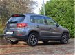 Volkswagen Tiguan - 2.0 TSI automaat / camera achter / zwart leer / stoelverwarming / cruise control - 1 - Thumbnail