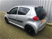 Toyota Aygo - 1.0-12V + NIEUWSTAAT/AIRCO/5-DEURS/DEALERONDERHOUDEN/2-SLEUTELS - 1 - Thumbnail