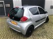 Toyota Aygo - 1.0-12V + NIEUWSTAAT/AIRCO/5-DEURS/DEALERONDERHOUDEN/2-SLEUTELS - 1 - Thumbnail