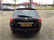 Renault Clio Estate - 1.5 dCi 20th Anniversary vol optie, s airco navi elle pakket cd speler cr-cont - 1 - Thumbnail