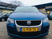 Volkswagen Touran - 1.4 TSI Trendline FREESTYLE 140PK*NAVIGATIE*CLIMA*CRUISECTR*STOELVERW.*PDC*LMVEL - 1 - Thumbnail