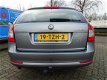 Skoda Octavia Combi - 1.2 TSI AMBITION BUSINESS LINE ECC/CRUISE/NAV/PARK.SENS/LMV/TREKHAAK - 1 - Thumbnail