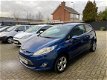 Ford Fiesta - 1.25 Titanium 2009, Airco, Climate, weinig km - 1 - Thumbnail