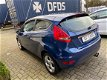 Ford Fiesta - 1.25 Titanium 2009, Airco, Climate, weinig km - 1 - Thumbnail