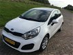 Kia Rio - 1.2 CVVT Plus Pack Zééér Netjes! Van 1e eigenaresse. - 1 - Thumbnail