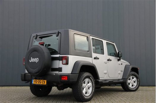 Jeep Wrangler Unlimited - 2.8 CRD Sport 4WD HARDTOP / AIRCO / GEEL KENTEKEN - 1