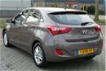 Hyundai i30 - 1.4i i-Drive 5-Deurs 2013 Airco, Led, LM Velgen, Parkeer Sensors - 1 - Thumbnail