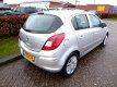 Opel Corsa - 1.4i 16V Enjoy 5 deurs + Airco - Cruisecontrol - 1 - Thumbnail