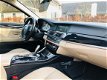 BMW 5-serie - 520i High Executive -LEER-NAVIGATIE-PDC-XENON-SCHUIFDAK - 1 - Thumbnail