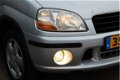 Suzuki Ignis - 1.3-16V GS (83pk) Elek.Ramen/ C.V./ Stuurbekracht./ LMV/ Radio-Cd/ Dakrail/ Trekhaak/ - 1 - Thumbnail