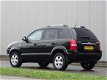 Hyundai Tucson - 2.0i Sport _@ Leer Ecc 134.039km - 1 - Thumbnail