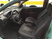 Opel Corsa - 1.2-16V Comfort - 1 - Thumbnail