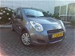 Suzuki Alto - 1.0 68pk Comfort | Airco | Afst. CDV - 1 - Thumbnail