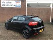 Kia Rio - 1.2 85pk 5D Comfort Pack | Airco | Navi | 17 inch - 1 - Thumbnail