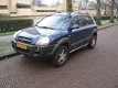 Hyundai Tucson - 2.7i V6 StyleVersion 4WD - 1 - Thumbnail