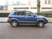 Hyundai Tucson - 2.7i V6 StyleVersion 4WD - 1 - Thumbnail