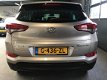 Hyundai Tucson - 1.6 GDi Comfort *NAVI*STOEL VERW*CRUISE-CONTROL - 1 - Thumbnail