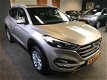 Hyundai Tucson - 1.6 GDi Comfort *NAVI*STOEL VERW*CRUISE-CONTROL - 1 - Thumbnail