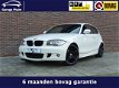 BMW 1-serie - 118i/Origineel M-pakket/M-sport velgen/Sportstoelen/Cruise - 1 - Thumbnail