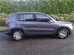 Volkswagen Tiguan - 1.4 TSI Comfort&Design Edition *NAVI*CC*PDC*LMV*TREKHAAK - 1 - Thumbnail