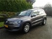 Volkswagen Tiguan - 1.4 TSI Comfort&Design Edition *NAVI*CC*PDC*LMV*TREKHAAK - 1 - Thumbnail