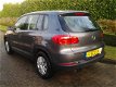 Volkswagen Tiguan - 1.4 TSI Comfort&Design Edition *NAVI*CC*PDC*LMV*TREKHAAK - 1 - Thumbnail