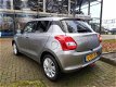 Suzuki Swift - 1.2 Select Airco Navigatie Rijklaar - 1 - Thumbnail