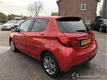 Toyota Yaris - 1.5 88pk hybride aut dynamic - pano - leer - clima - adaptive cruise - cam. - line as - 1 - Thumbnail