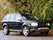 Volvo XC90 - 2.4 D5 Exec. R-design 7 pers. Navi, Leer, enz - 1 - Thumbnail