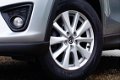 Mazda CX-5 - 2.0 Skylease 2WD 1e eig NAVI Cruise Keurige auto - 1 - Thumbnail