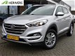 Hyundai Tucson - 1.7 CRDi Comfort *Navigatie, Trekhaak, Climate, Cruise Control, Leder - 1 - Thumbnail