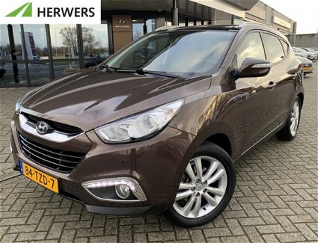 Hyundai ix35 - 2.0i i-Catcher *Navigatie, Trekhaak, Cruise Control, Clima, Camera - 1