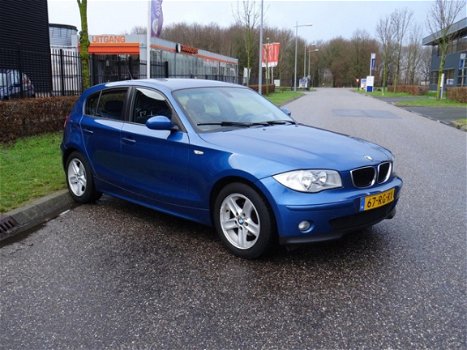 BMW 1-serie - 118i High Executive | Aut. | Airco | Cruise | PDC - 1