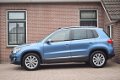 Volkswagen Tiguan - 1.4 TSI 160pk DSG Sport&Style Xenon Ecc Pdc Pano Trekhaak Navigatie - 1 - Thumbnail