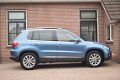 Volkswagen Tiguan - 1.4 TSI 160pk DSG Sport&Style Xenon Ecc Pdc Pano Trekhaak Navigatie - 1 - Thumbnail