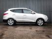 Hyundai ix35 - 2.0i 4WD, i-Catcher panoramadak, 100% Dealer Onderhouden, 1Ste Eigenaar, Leer, Navi, - 1 - Thumbnail