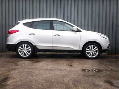 Hyundai ix35 - 2.0i 4WD, i-Catcher panoramadak, 100% Dealer Onderhouden, 1Ste Eigenaar, Leer, Navi, - 1