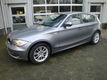 BMW 1-serie - 118i Business Line/ NL auto - 1 - Thumbnail