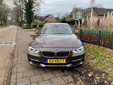 BMW 3-serie - Luxury Line, Leder, NavigatieProf, Keyless Go, Harman Kardon - 1