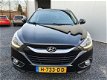 Hyundai ix35 - NAVI LEER CAMERA CLIMA 4xSTOEL/VERW CR/CONTR PDC CARPASS DEALERONDERHOUDEN TEL/BLEUTH - 1 - Thumbnail