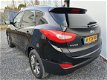 Hyundai ix35 - NAVI LEER CAMERA CLIMA 4xSTOEL/VERW CR/CONTR PDC CARPASS DEALERONDERHOUDEN TEL/BLEUTH - 1 - Thumbnail