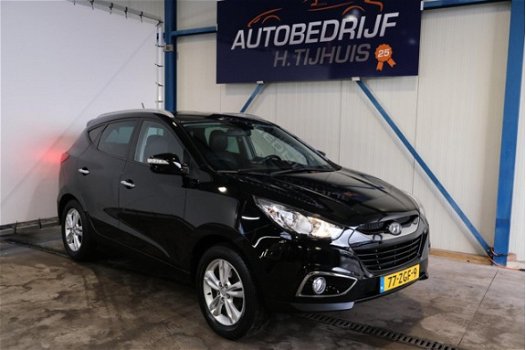 Hyundai ix35 - 2.0i Style Automaat - N.A.P. Airco, Cruise, Navi, PDC, Trekhaak - 1