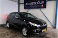 Hyundai ix35 - 2.0i Style Automaat - N.A.P. Airco, Cruise, Navi, PDC, Trekhaak - 1 - Thumbnail