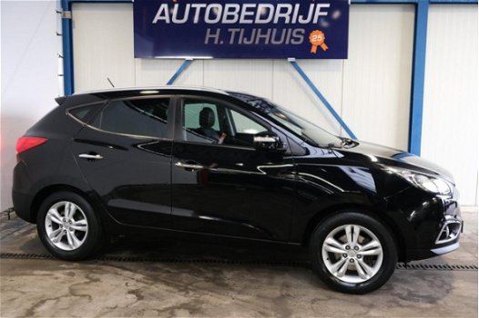 Hyundai ix35 - 2.0i Style Automaat - N.A.P. Airco, Cruise, Navi, PDC, Trekhaak - 1