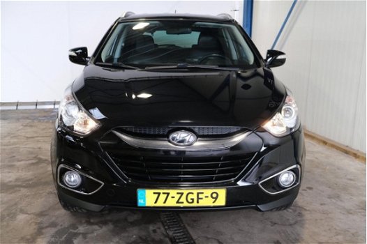 Hyundai ix35 - 2.0i Style Automaat - N.A.P. Airco, Cruise, Navi, PDC, Trekhaak - 1