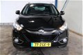 Hyundai ix35 - 2.0i Style Automaat - N.A.P. Airco, Cruise, Navi, PDC, Trekhaak - 1 - Thumbnail