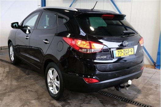 Hyundai ix35 - 2.0i Style Automaat - N.A.P. Airco, Cruise, Navi, PDC, Trekhaak - 1